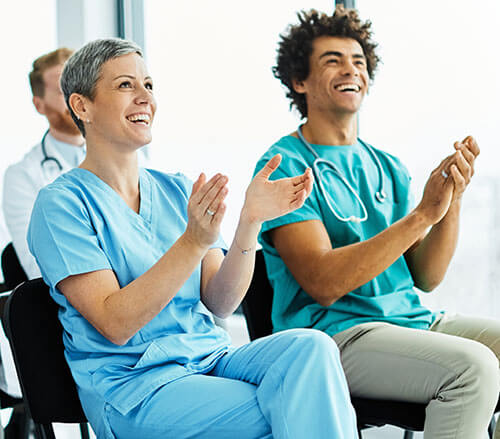 Doctors and nurses in a meeting.
