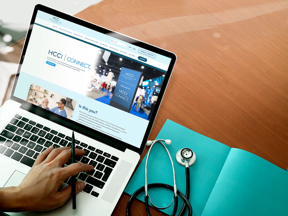top view of Medicine doctor hand working with modern computer and smart phone on wooden desk as medical concept
