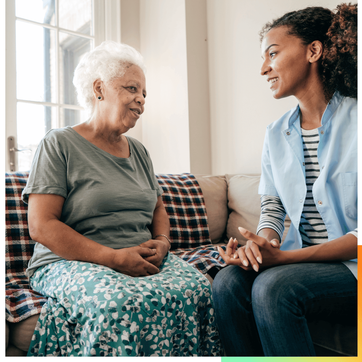 Young woman aiding to an elder woman