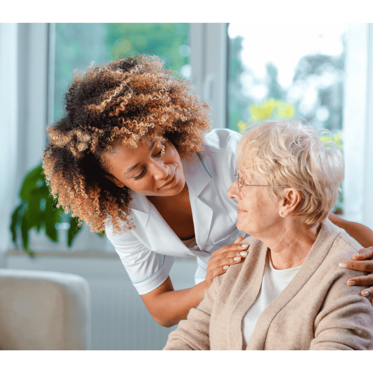 Nurse aiding to elder woman