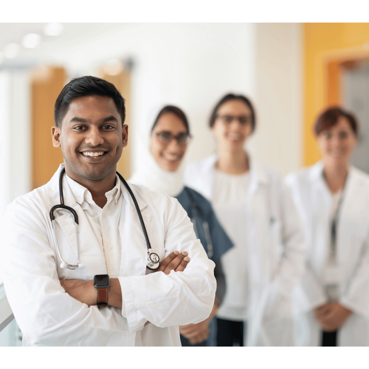 Doctor and nurses smiling